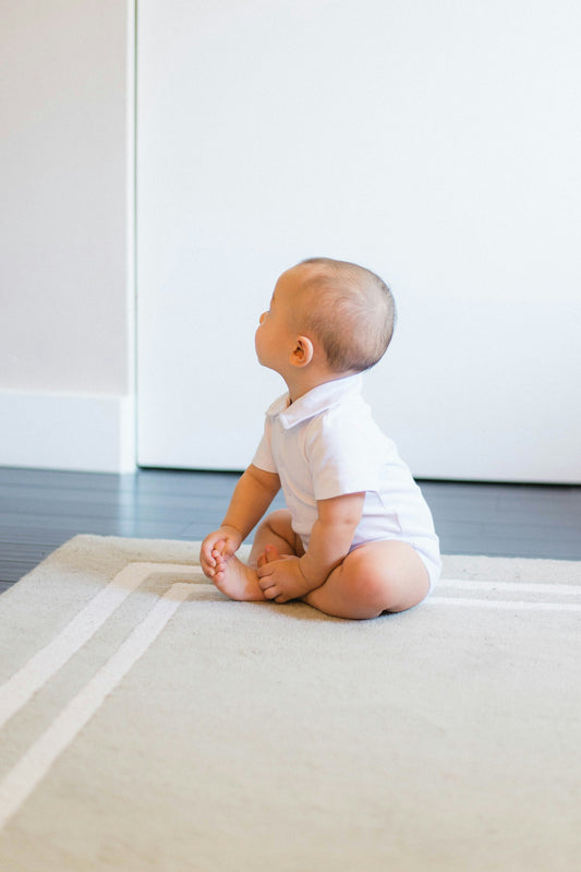 What babies do with their hands in the first year